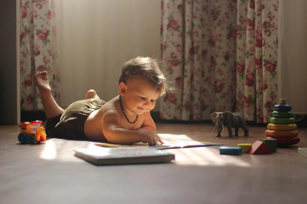 Baby Playing with Developmental Toys